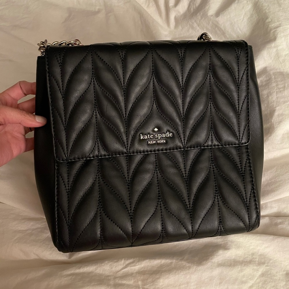 Kate Spades Briar Lane Quilted Backpack/Crossbody Gem